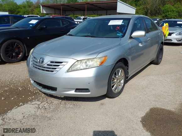 2007 Toyota Camry CE with VIN JTNBE46K773058525, listed as a IAAI auction lot 41927357 with 245,984 mi miles. Bid and sale history available at carsss.com. Image 2.