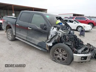 2015 Ford F-150 XLT with VIN 1FTEW1EG0FKE67898, listed as a IAAI auction lot 41407634 with 1 mi miles. Bid and sale history available at carsss.com. Image 1.