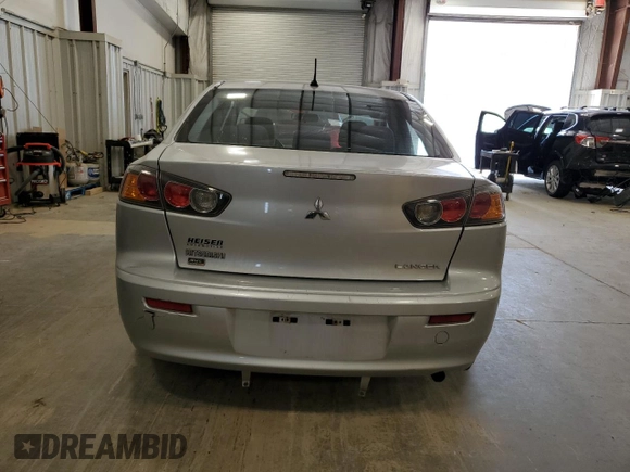 2012 Mitsubishi Lancer SE with VIN JA32V2FW2CU008971, listed as a Copart auction lot 61048685 with 124,815 mi miles and Non repairable. Bid and sale history available at DreamBid. Image 6.