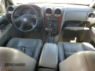 2005 GMC Envoy SLT with VIN 1GKET16M156182653, listed as a Copart auction lot 68747784 with 306,802 mi miles and Salvage Title. Bid and sale history available at DreamBid. Image 8.