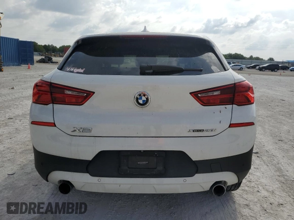 2018 BMW X2 xDrive28i with VIN WBXYJ5C32JEF79876, listed as a Copart auction lot 50138865 with 58,303 mi miles and Salvage Title. Bid and sale history available at carsss.com. Image 6.