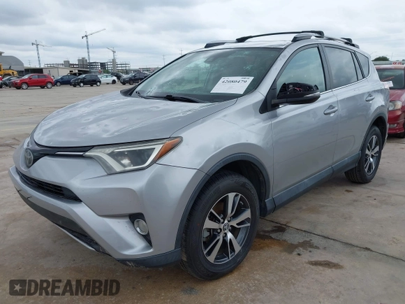 2017 Toyota RAV4 XLE with VIN 2T3WFREV3HW321796, listed as a IAAI auction lot 42080479 with 104,014 mi miles and . Bid and sale history available at DreamBid. Image 18.