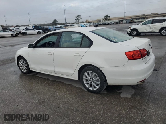2012 Volkswagen Jetta SE с VIN 3VWDX7AJ6CM334691, выставлен на аукционе Copart как лот 48074335 с пробегом 105 314 миль миль и Списание • Salvage title. История ставок и продаж доступна на DreamBid. Изображение 2.