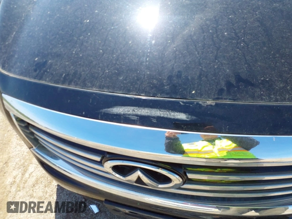 2014 Infiniti QX60 with VIN 5N1AL0MM1EC542704, listed as a IAAI auction lot 42046845 with 76,128 mi miles and . Bid and sale history available at DreamBid. Image 6.