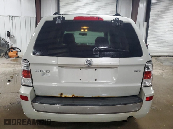 2009 Mercury Mariner Premier with VIN 4M2CU97G59KJ20381, listed as a Copart auction lot 56682175 with 155,896 mi miles and Salvage title. Bid and sale history available at DreamBid. Image 6.