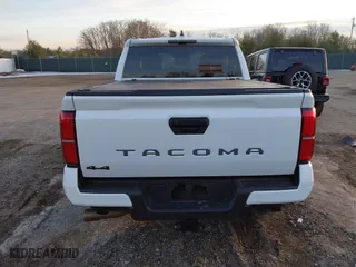 2024 Toyota Tacoma 4WD SR5 with VIN 3TMLB5JN4RM025976, listed as a IAAI auction lot 41073693 with 14,215 mi miles. Bid and sale history available at carsss.com. Image 16.