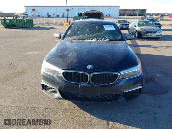 2018 BMW 5 Series M550i xDrive with VIN WBAJB9C59JG463948, listed as a IAAI auction lot 41845989 with 99,385 mi miles. Bid and sale history available at carsss.com. Image 12.