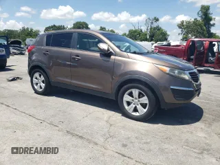2012 Kia Sportage LX with VIN KNDPB3A20C7276250, listed as a Copart auction lot 61804995 with 112,303 mi miles and Salvage title. Bid and sale history available at DreamBid. Image 4.