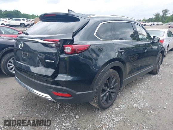 2022 Mazda CX-9 Touring Plus z VIN JM3TCBAY2N0619279, wystawiony jako IAAI lot #42373722 z przebiegiem 43 540 mil mil oraz . Historia ofert i sprzedaży dostępna na DreamBid. Obrazek 4.
