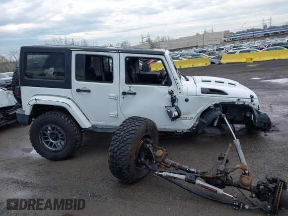 2015 Jeep Wrangler Unlimited Sahara with VIN 1C4BJWEG5FL518191, listed as a IAAI auction lot 41914581 with 107,433 mi miles. Bid and sale history available at carsss.com. Image 13.