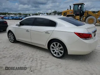 2013 Buick LaCrosse Touring with VIN 1G4GJ5G35DF302150, listed as a Copart auction lot 55142355 with 131,571 mi miles and Salvage title. Bid and sale history available at DreamBid. Image 2.