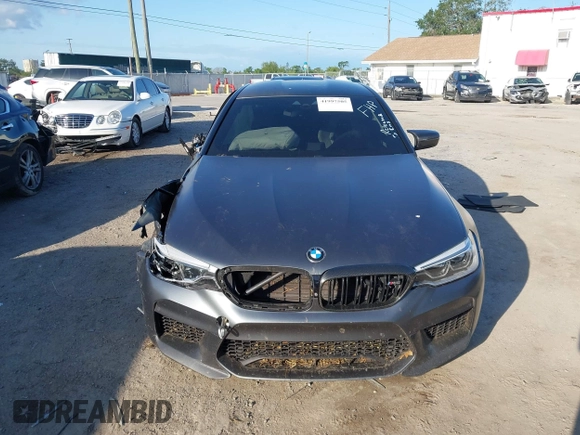 2019 BMW M5 Competition z VIN WBSJF0C59KB447419, wystawiony jako IAAI lot #41997505 z przebiegiem 74 990 mil mil oraz . Historia ofert i sprzedaży dostępna na DreamBid. Obrazek 12.