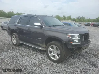 2015 Chevrolet Tahoe LTZ with VIN 1GNSCCKC8FR628330, listed as a Copart auction lot 54561835 with 212,503 mi miles and Salvage Title. Bid and sale history available at carsss.com. Image 4.