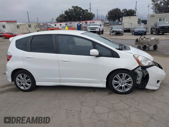 2009 Honda Fit Sport with VIN JHMGE88409S021730, listed as a IAAI auction lot 42045023 with 309,995 mi miles. Bid and sale history available at carsss.com. Image 13.
