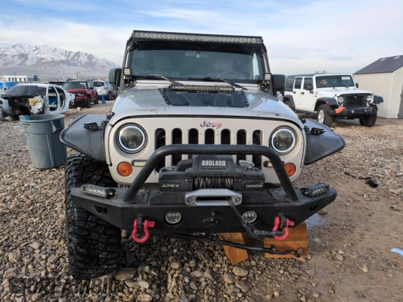 2007 Jeep Wrangler Rubicon z VIN 1J8GA64157L125319, wystawiony jako Copart lot #82929184 z przebiegiem 82 019 mil mil oraz Szkoda całkowita • Salvage title. Historia ofert i sprzedaży dostępna na DreamBid. Obrazek 5.