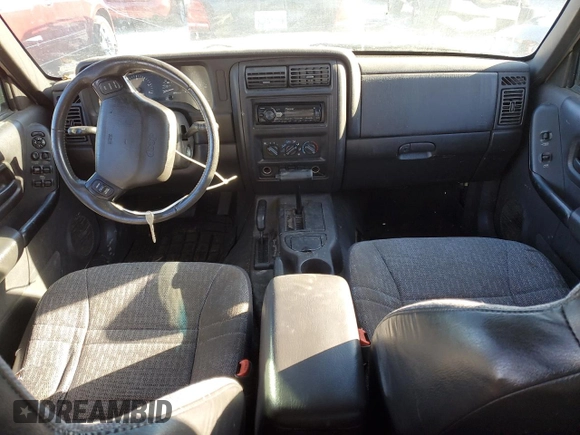 2001 Jeep Cherokee Sport z VIN 1J4FF48S71L532376, wystawiony jako Copart lot #81408644 z przebiegiem 230 058 mil mil oraz Szkoda całkowita • Salvage title. Historia ofert i sprzedaży dostępna na DreamBid. Obrazek 8.