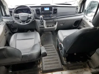 2023 Ford Transit with VIN 1FTBF2YG9PKA02445, listed as a Copart auction lot 64476254 with 24,922 mi miles and Salvage Title. Bid and sale history available at DreamBid. Image 8.