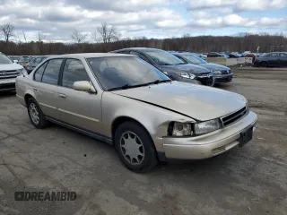 1990 Nissan Maxima z VIN JN1HJ01P8LT402950, wystawiony jako Copart lot #82714734 z przebiegiem 60 727 mil mil oraz Tytuł czysty. Historia ofert i sprzedaży dostępna na DreamBid. Obrazek 4.