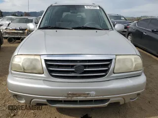 2003 Suzuki XL7 Touring z VIN JS3TX92V934111781, wystawiony jako Copart lot #47422395 z przebiegiem 248 137 mil mil oraz Czysty tytuł • Clean title. Historia ofert i sprzedaży dostępna na DreamBid. Obrazek 5.