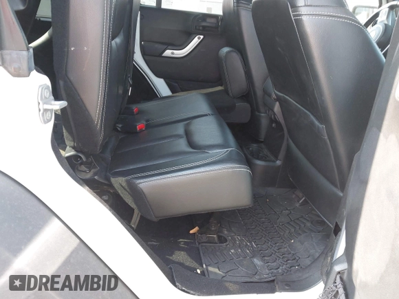 2015 Jeep Wrangler Unlimited Rubicon with VIN 1C4BJWFG1FL602412, listed as a IAAI auction lot 42065619 with 109,070 mi miles. Bid and sale history available at carsss.com. Image 8.