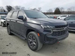 2022 Chevrolet Tahoe Z71 with VIN 1GNSKPKD8NR250947, listed as a Copart auction lot 42434035 with 57,665 mi miles and Salvage Title. Bid and sale history available at carsss.com. Image 4.