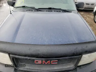 2003 GMC Jimmy z VIN 1GKCT18X13K112296, wystawiony jako Copart lot #46479275 z przebiegiem Nie podano mil oraz Czysty tytuł • Clean title. Historia ofert i sprzedaży dostępna na DreamBid. Obrazek 7.