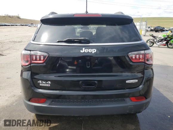 2018 Jeep Compass Altitude with VIN 3C4NJDBBXJT150565, listed as a Copart auction lot 54413725 with 68,790 mi miles and Salvage title. Bid and sale history available at DreamBid. Image 6.