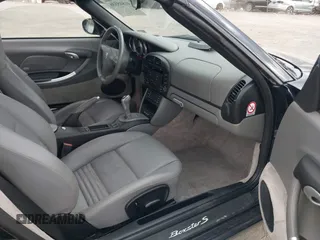 2003 Porsche Boxster S с VIN WP0CB29853U662035, выставлен на аукционе IAAI как лот 41845536 с пробегом 42 026 миль миль и . История ставок и продаж доступна на DreamBid. Изображение 5.