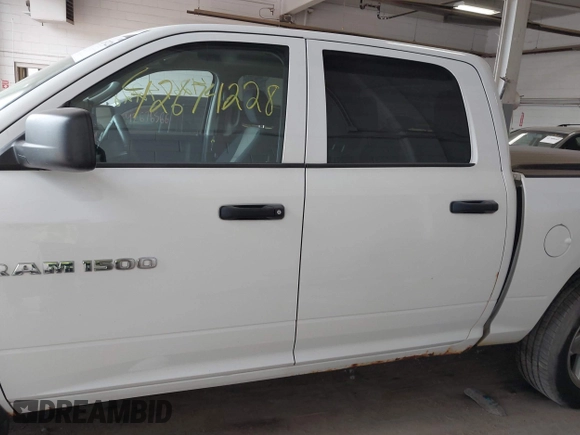 2012 Ram 1500 Express with VIN 1C6RD7KT6CS341995, listed as a IAAI auction lot 42674228 with 202,070 mi miles and . Bid and sale history available at DreamBid. Image 14.