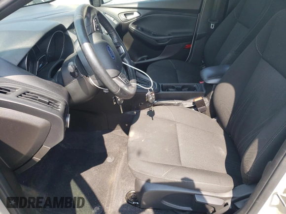 2016 Ford Focus SE with VIN 1FADP3FE8GL353103, listed as a Copart auction lot 64972865 with 131,403 mi miles and Clean title. Bid and sale history available at DreamBid. Image 7.