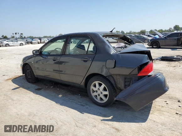 2002 Mitsubishi Lancer LS with VIN JA3AJ36E32U030366, listed as a Copart auction lot 68933044 with 0 mi miles and Salvage Title. Bid and sale history available at carsss.com. Image 2.