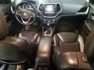 2015 Jeep Cherokee Trailhawk z VIN 1C4PJMBS8FW665607, wystawiony jako Copart lot #51536715 z przebiegiem 166 443 mil mil oraz Szkoda całkowita • Salvage title. Historia ofert i sprzedaży dostępna na DreamBid. Obrazek 8.