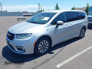 2023 Chrysler Pacifica Hybrid Touring L with VIN 2C4RC1L75PR614460, listed as a IAAI auction lot 42628545 with 68,668 mi miles and . Bid and sale history available at DreamBid. Image 17.