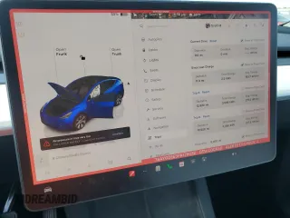 2023 Tesla Model Y Long Range z VIN 7SAYGDEE3PA178832, wystawiony jako Copart lot #57156005 z przebiegiem 12 920 mil mil oraz Szkody całkowita. Historia ofert i sprzedaży dostępna na DreamBid. Obrazek 9.