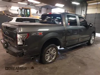 2018 Ford F-150 XL with VIN 1FTEW1EP5JFC37436, listed as a IAAI auction lot 41807561 with 133,159 mi miles and . Bid and sale history available at carsss.com. Image 6.