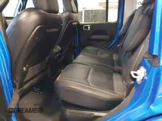 2024 Jeep Wrangler Sahara with VIN 1C4RJXP64RW170976, listed as a IAAI auction lot 41867996 with 4,406 mi miles and . Bid and sale history available at DreamBid. Image 8.