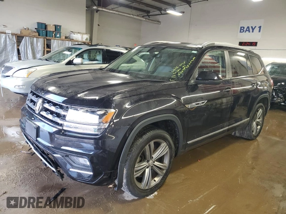 2019 Volkswagen Atlas SEL R-Line with VIN 1V2RR2CA6KC564779, listed as a Copart auction lot 52622765 with 52,615 mi miles and Salvage title. Bid and sale history available at DreamBid. Image 1.