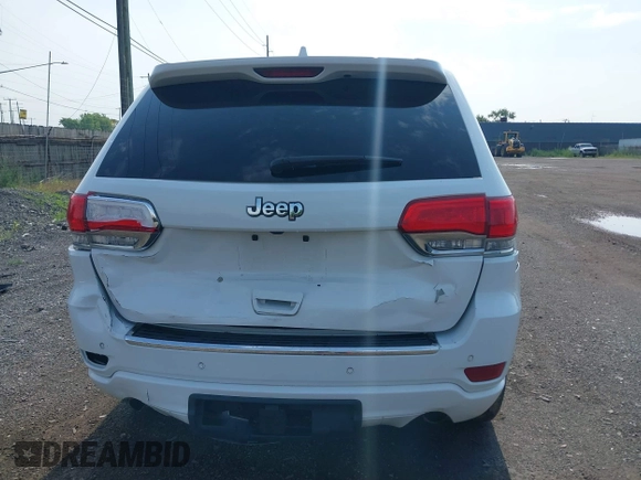 2017 Jeep Grand Cherokee Overland with VIN 1C4RJFCT6HC880306, listed as a IAAI auction lot 42534987 with 97,976 mi miles and . Bid and sale history available at DreamBid. Image 16.