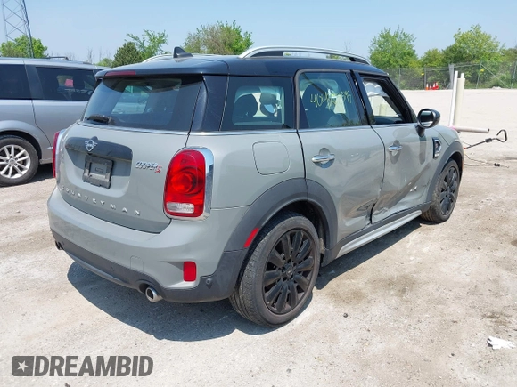 2020 MINI Countryman Cooper S with VIN WMZYX1C08L3L66257, listed as a IAAI auction lot 42402345 with 28,609 mi miles and . Bid and sale history available at DreamBid. Image 4.
