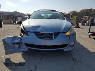 2004 Toyota Solara SE z VIN 4T1CE38P94U774999, wystawiony jako Copart lot #77961134 z przebiegiem 94 339 mil mil oraz Tytuł czysty. Historia ofert i sprzedaży dostępna na DreamBid. Obrazek 5.