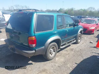 1998 Ford Explorer Sport с VIN 1FMYU22X7WUC36106, выставлен на аукционе IAAI как лот 41957820 с пробегом 163 881 миль миль и . История ставок и продаж доступна на DreamBid. Изображение 4.