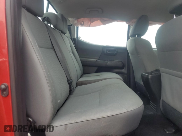 2018 Toyota Tacoma SR z VIN 5TFCZ5AN8JX143944, wystawiony jako Copart lot #57092795 z przebiegiem 67 094 mil mil oraz Szkoda całkowita • Salvage title. Historia ofert i sprzedaży dostępna na DreamBid. Obrazek 10.