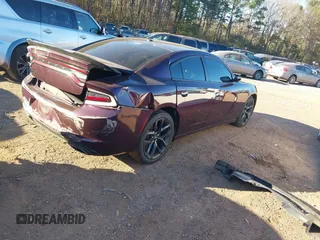 2022 Dodge Charger SXT with VIN 2C3CDXBG0NH123597, listed as a IAAI auction lot 41213490 with 43,417 mi miles and . Bid and sale history available at DreamBid. Image 4.