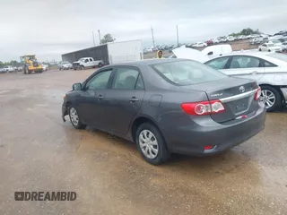 2011 Toyota Corolla L with VIN JTDBU4EE3B9140115, listed as a IAAI auction lot 42052792 with 143,646 mi miles and . Bid and sale history available at DreamBid. Image 3.