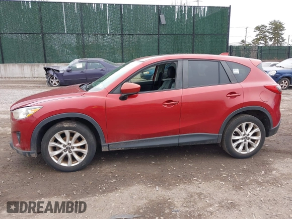 2013 Mazda CX-5 Grand Touring with VIN JM3KE4DE8D0164374, listed as a IAAI auction lot 41820866 with 145,815 mi miles. Bid and sale history available at carsss.com. Image 14.