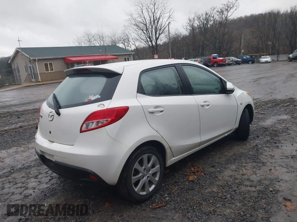 2012 Mazda 2 Touring z VIN JM1DE1LY4C0141202, wystawiony jako IAAI lot #41051663 z przebiegiem 160 364 mil mil oraz . Historia ofert i sprzedaży dostępna na DreamBid. Obrazek 4.