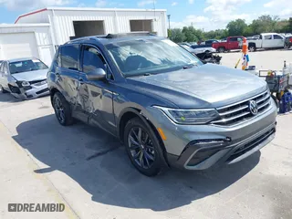 2023 Volkswagen Tiguan SE with VIN 3VVNB7AX5PM064693, listed as a IAAI auction lot 42033011 with 38,220 mi miles. Bid and sale history available at carsss.com. Image 1.