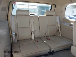 2014 Chevrolet Tahoe LTZ z VIN 1GNSCCE04ER141920, wystawiony jako IAAI lot #41484239 z przebiegiem 98 855 mil mil oraz . Historia ofert i sprzedaży dostępna na DreamBid. Obrazek 14.
