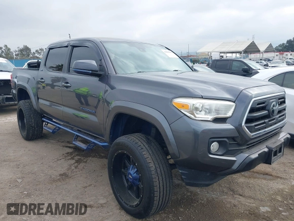 2018 Toyota Tacoma SR5 with VIN 5TFAZ5CNXJX066952, listed as a IAAI auction lot 41894562 with 141,818 mi miles and . Bid and sale history available at DreamBid. Image 1.