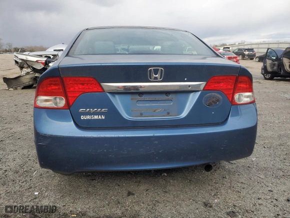 2010 Honda Civic Sdn LX with VIN 2HGFA1F59AH550523, listed as a Copart auction lot 87401754 with 79,046 mi miles and Salvage Title. Bid and sale history available at carsss.com. Image 6.